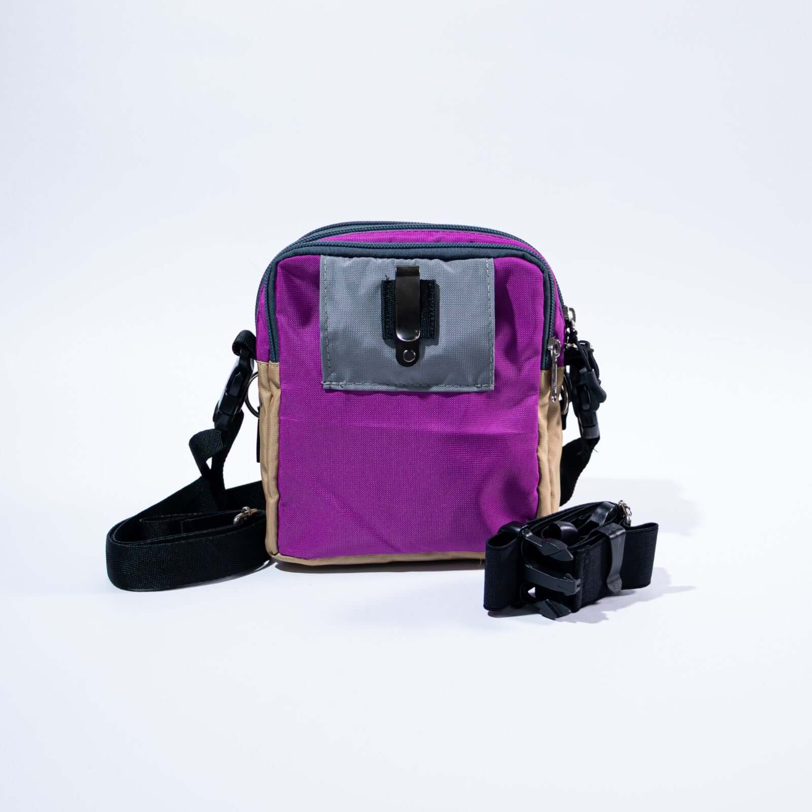 Crossbody lilac, beige and gray bag with a strap on a white background