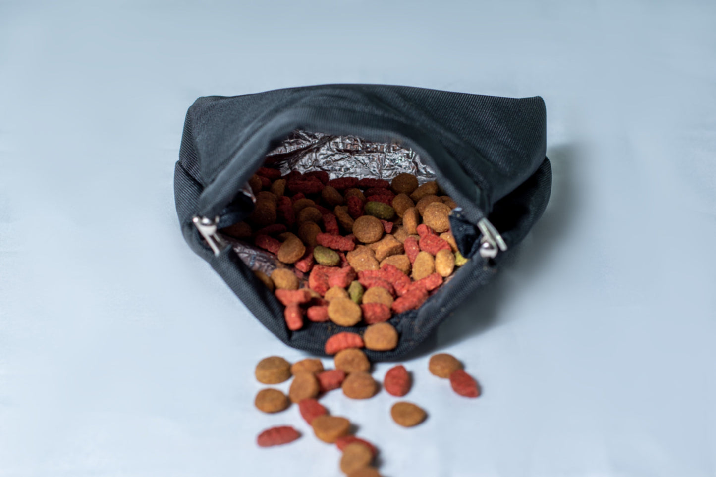 Insulated sleeve with metal closure fanny pack treat bag