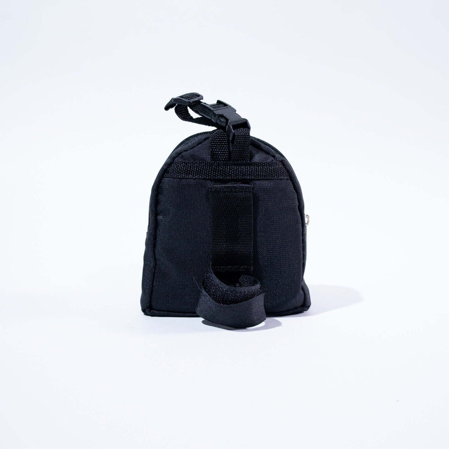 Black dog poop and treat bag on a white background