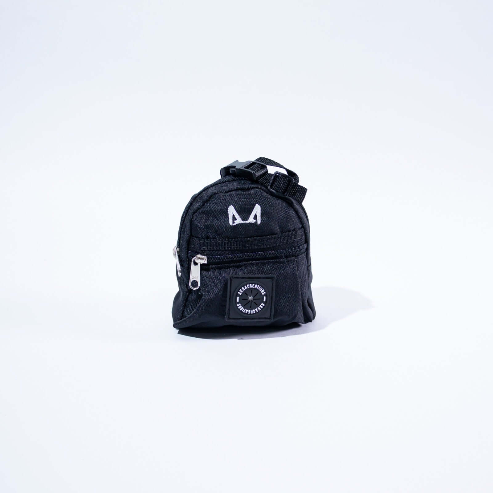 Black dog treat and poop bag holder with a logo on a white background