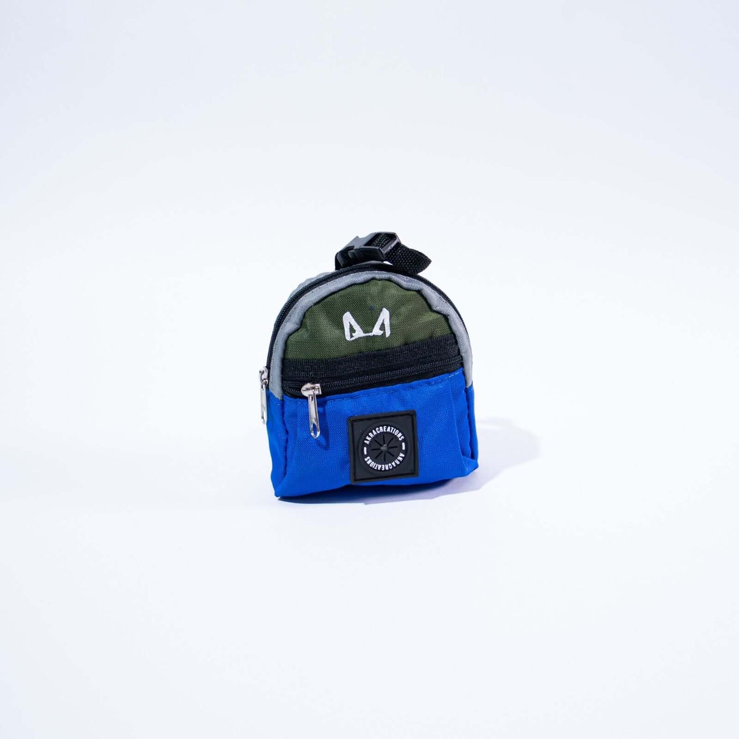Small green and blue poop bag and treat holder with a logo on a white background