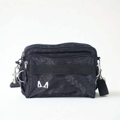 Black fanny pack bag with multiple compartments on a white background