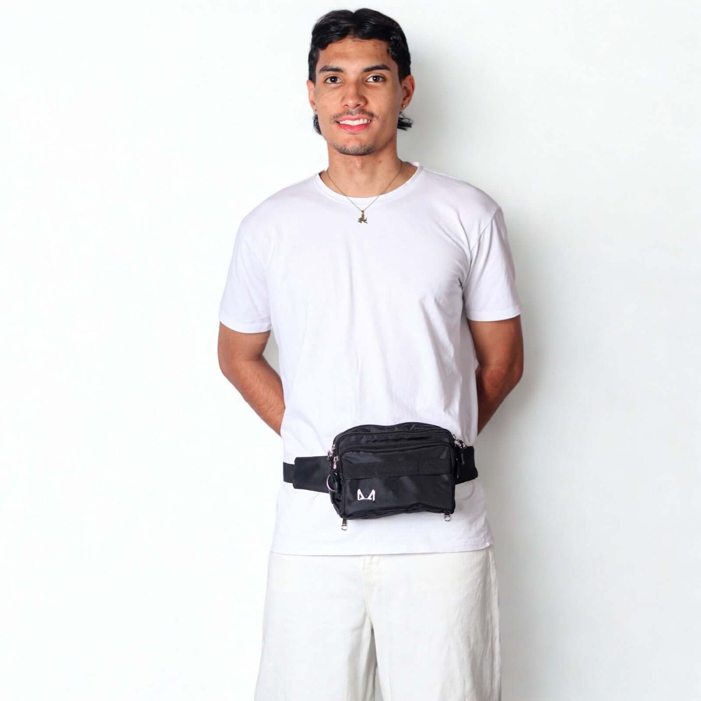 Male model wearing black fanny pack
